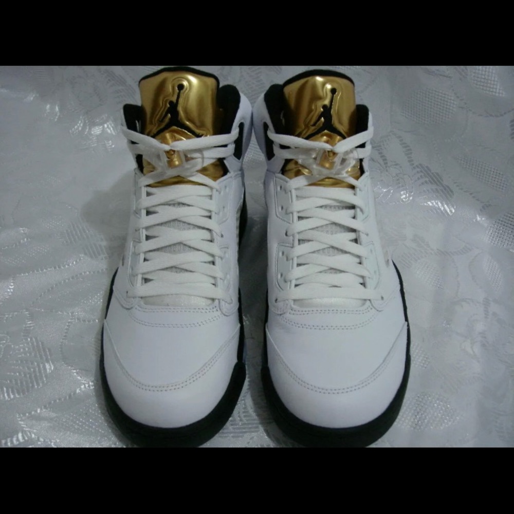 Gold coin Jordan 5s